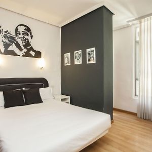 Kamer met een Queen Size Bed